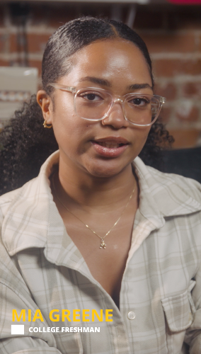 Woman wearing glasses with a blurred background